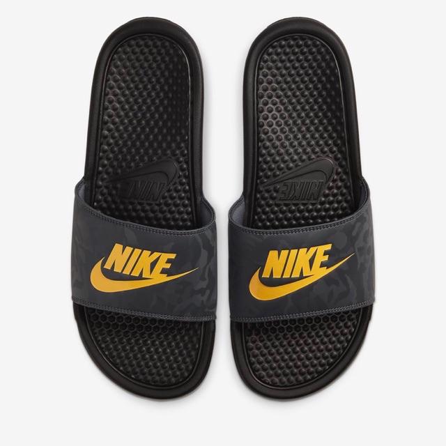 green and gold nike slides