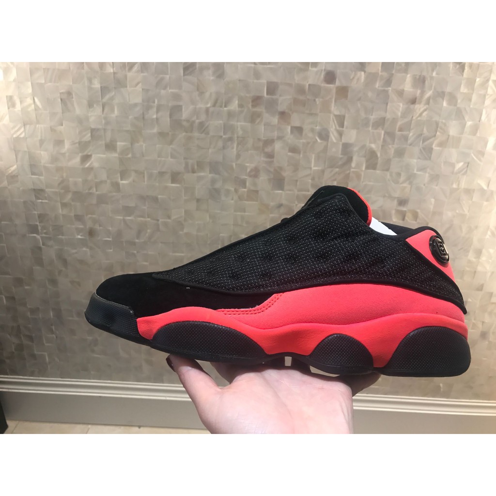 black and orange jordan 13