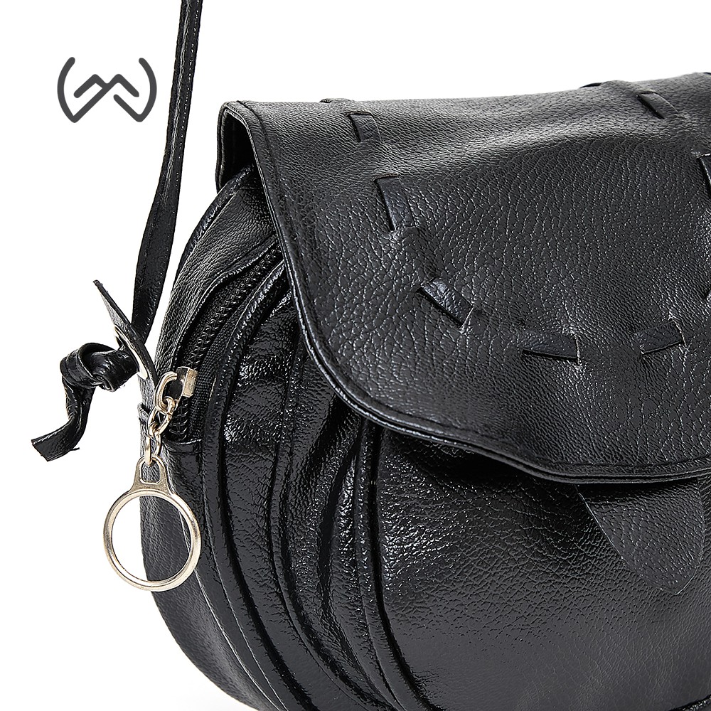 black round sling bag