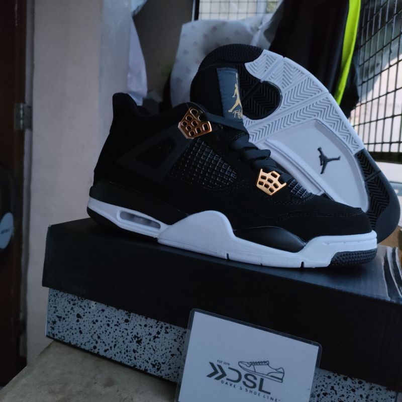 black and gold jordans retro 4