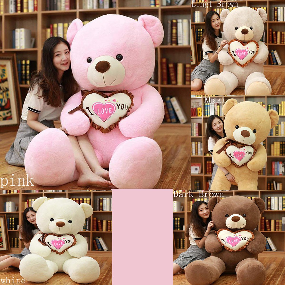 giant teddy bear with girl