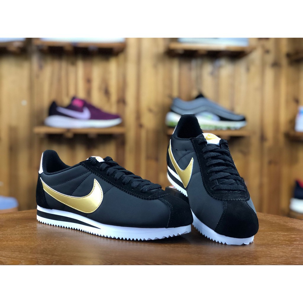 nike black and gold cortez