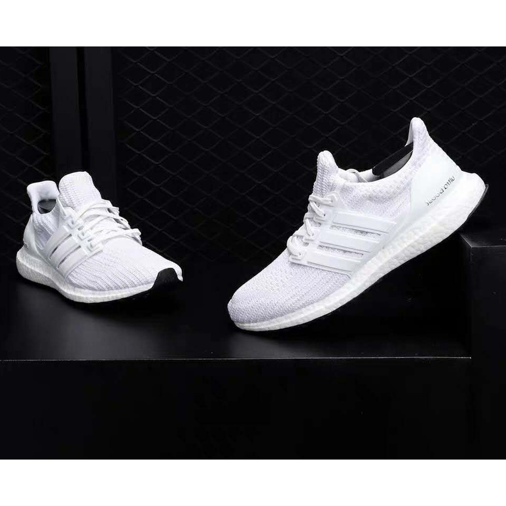 white adidas running shoes