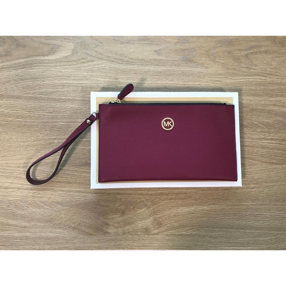 mk fulton large zip clutch