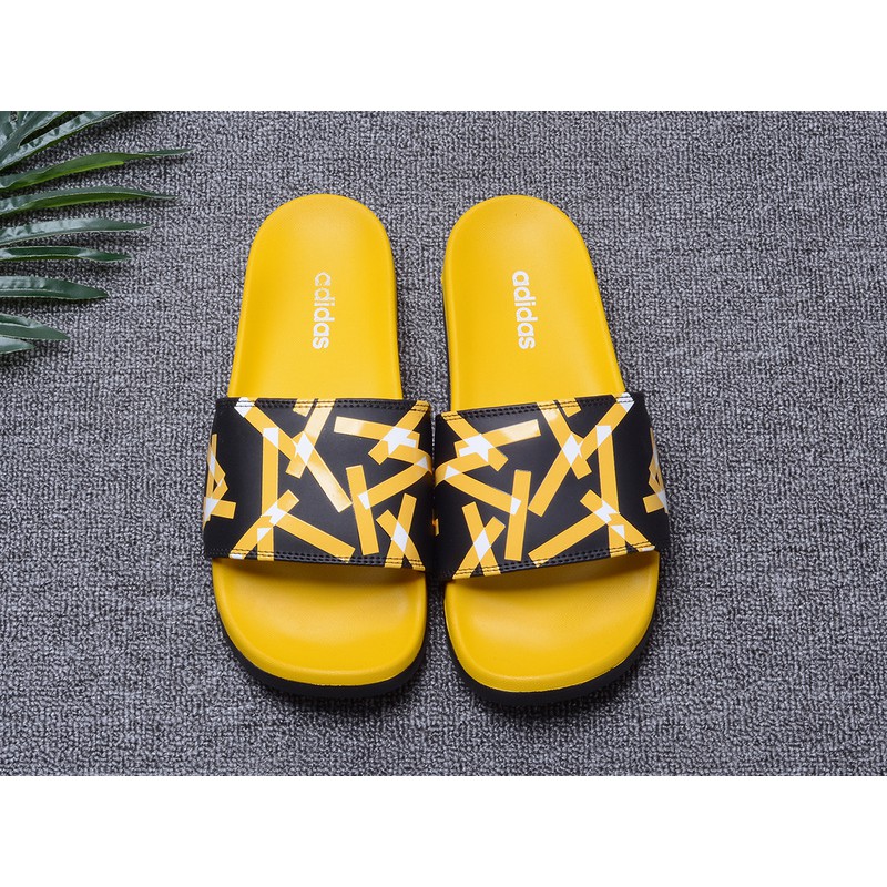 yellow adidas slippers