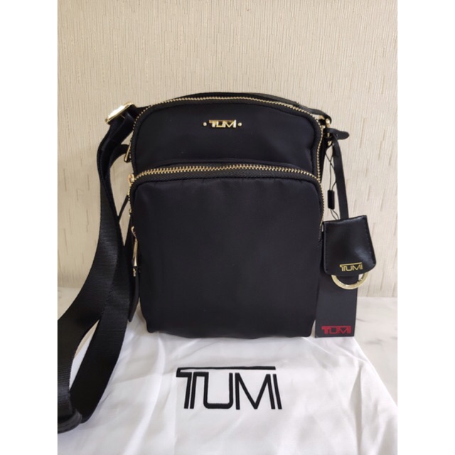 tumi sling bag women