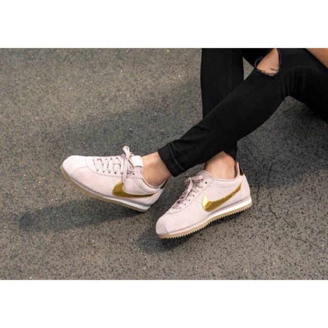 nike cortez with gold swoosh