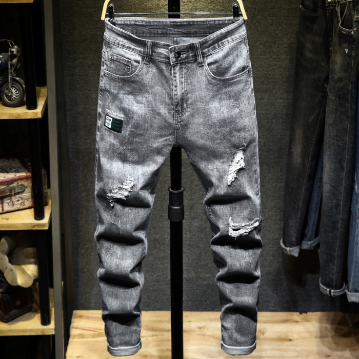 grey damaged jeans