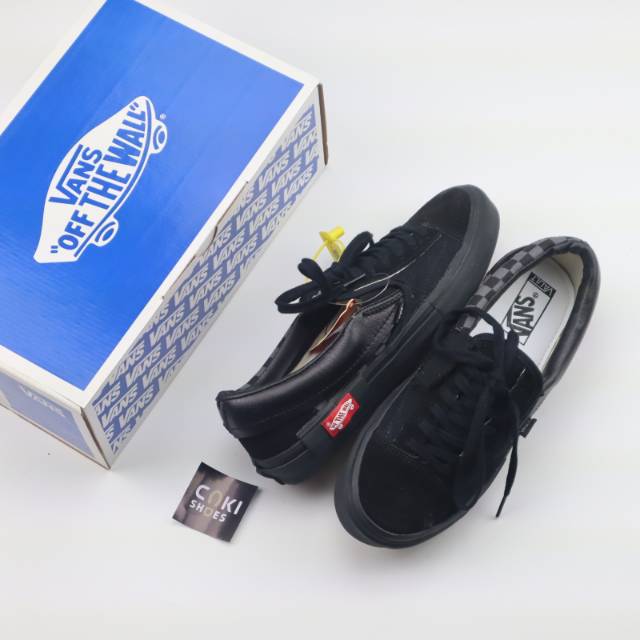 vans slip on cut and paste black