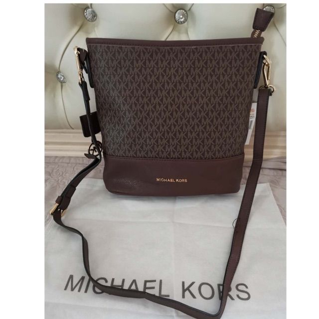 authentic mk sling bag