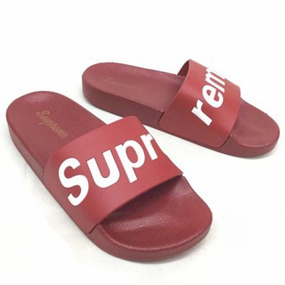 supreme flip flops red