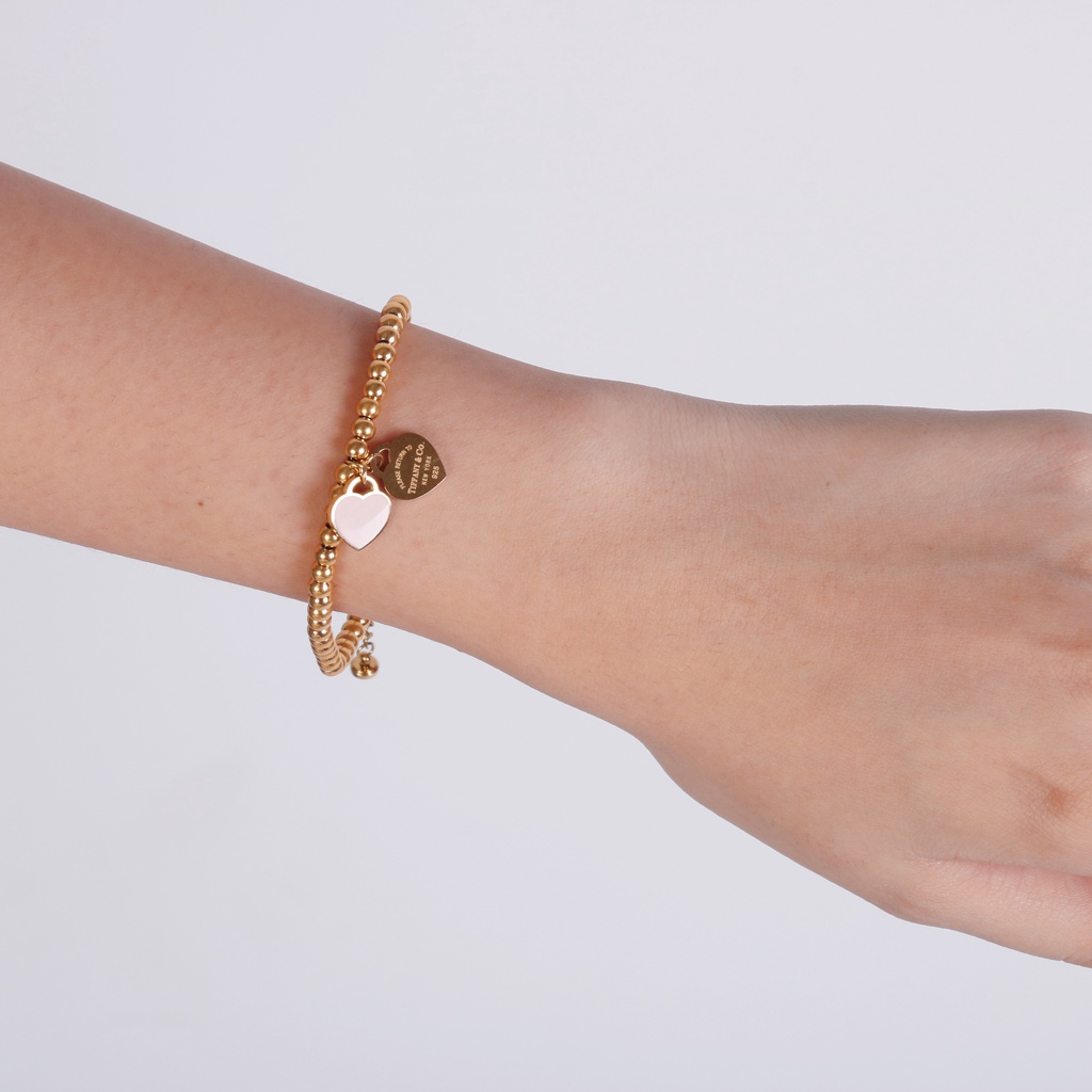 Sparkles by Olivia Manila Pink gold beads bracelet with heart charm