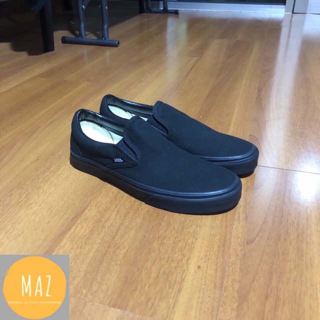 vans slip on full black original