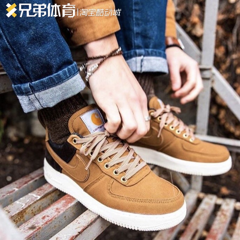 Brother Sports NIKE AIR FORCE 1 X CARHARTT A Group of Low-Top Sneakers ...