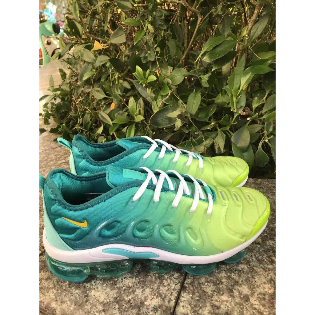 purple and turquoise air max plus