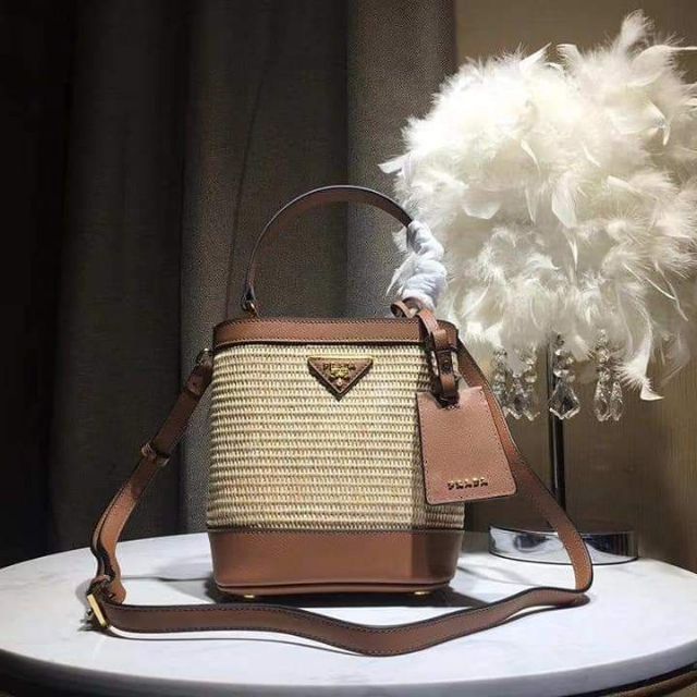 prada woven rattan clutch