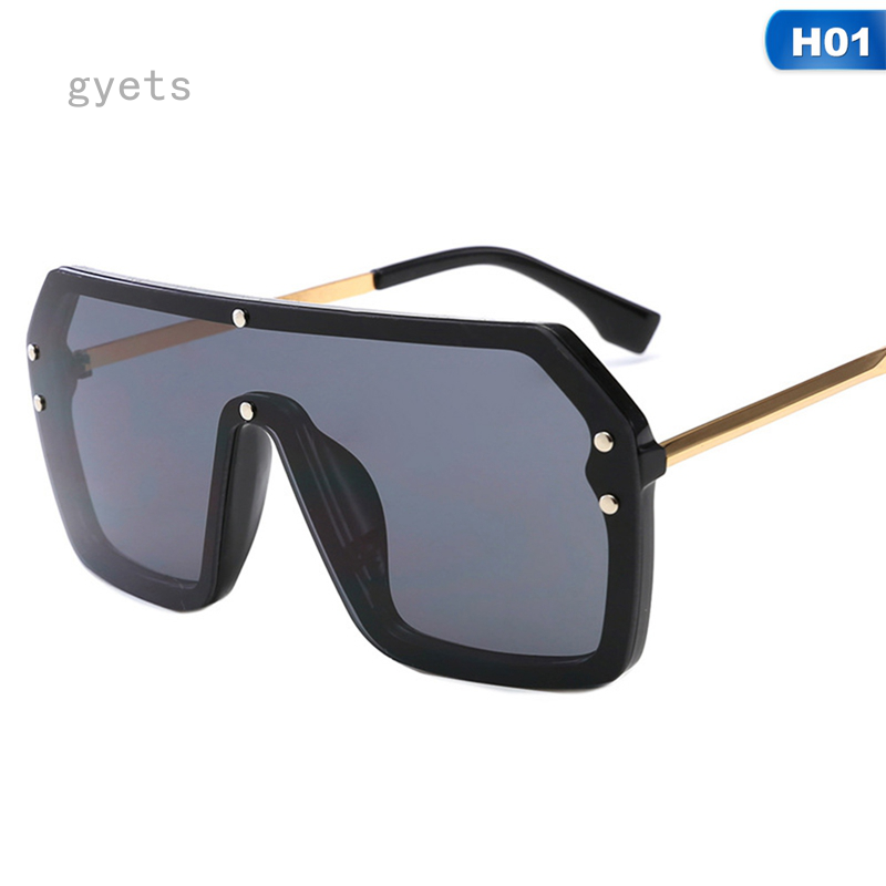 designer with big glasses