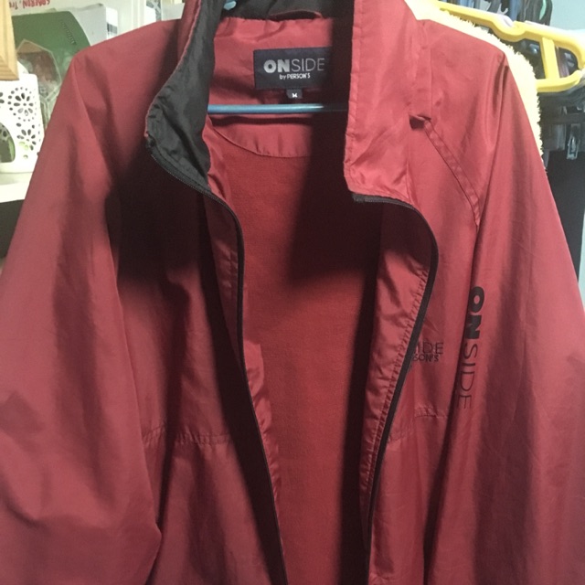 oversized red windbreaker