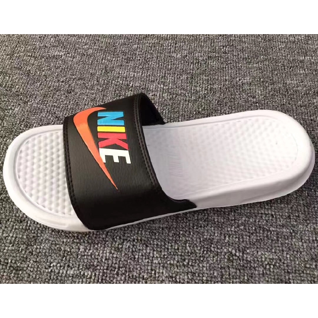 black and gold nike sandals