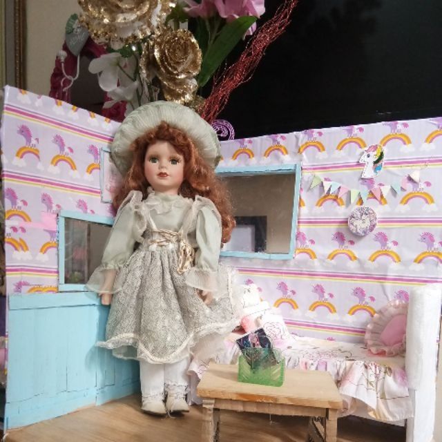 menie porcelain doll