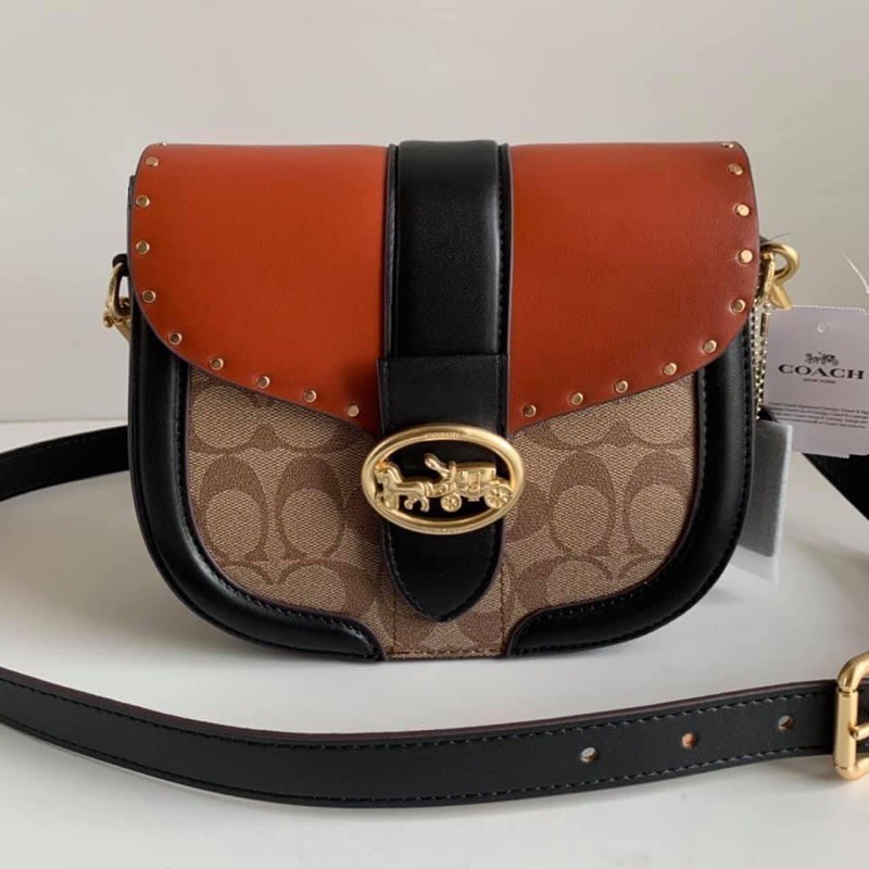 SADDLE BAG IN COLORBLOCK SIGNATURE CANVAS WITH RIVETS (COACH
