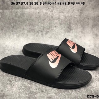 nike slippers black and gold