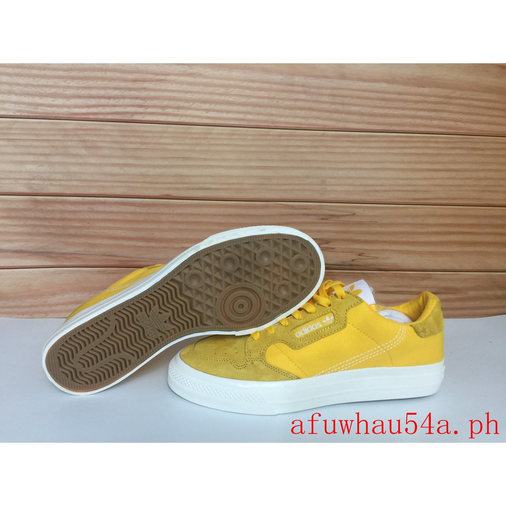 adidas continental yellow