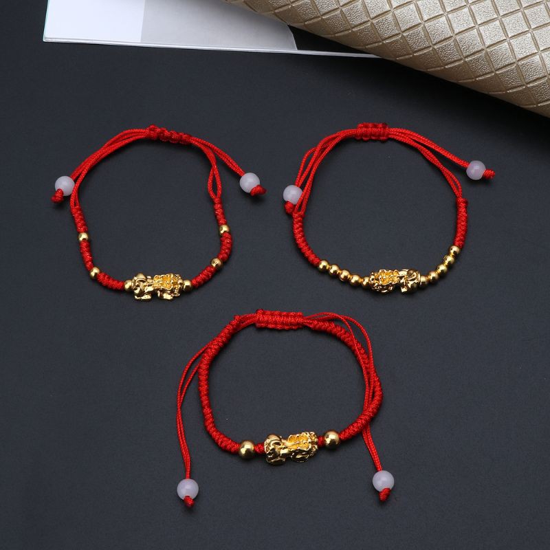 gold red bracelet