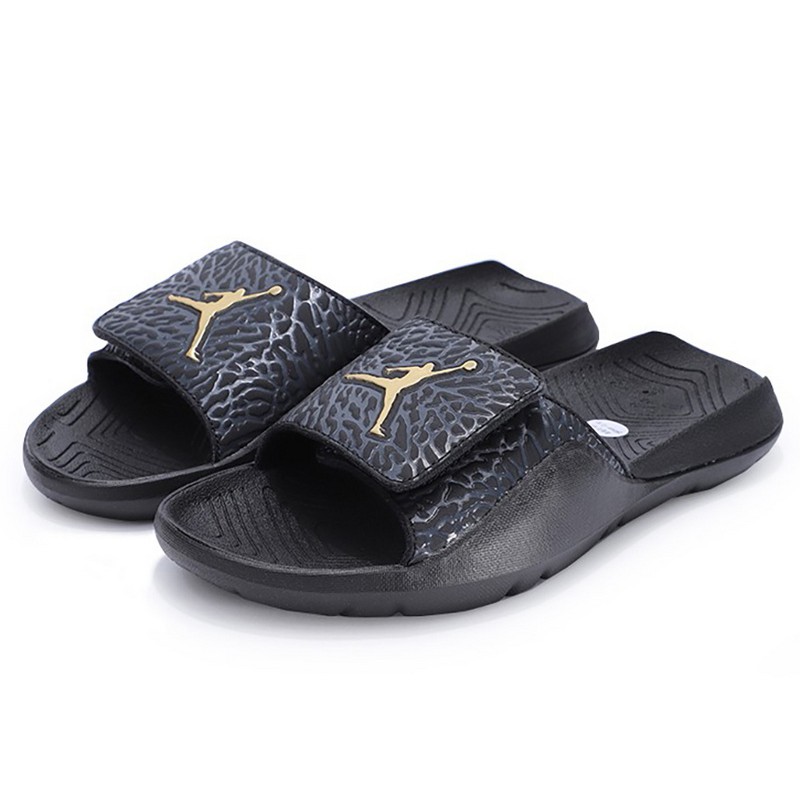 black and gold jordan sandals