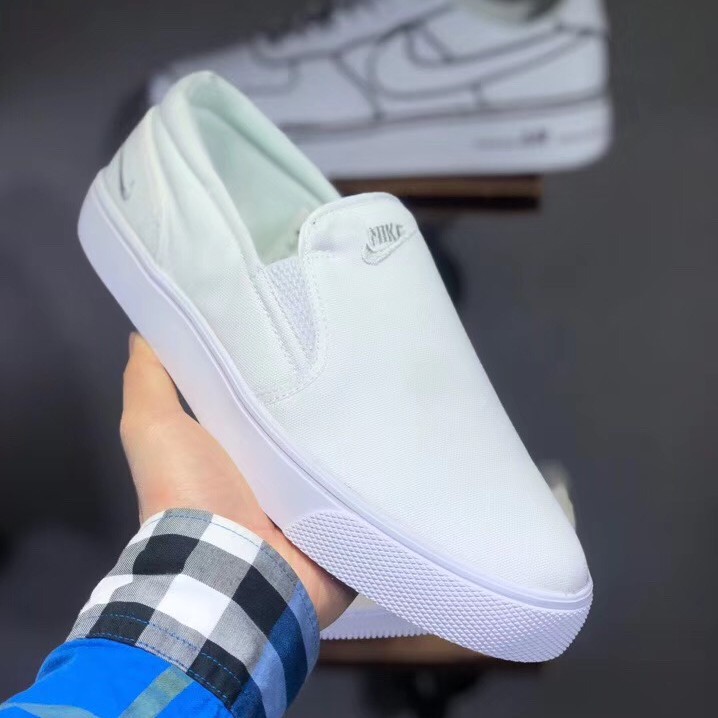 nike toki slip on white