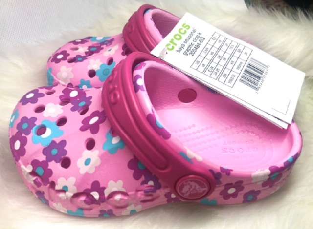 pink crocs with flowers