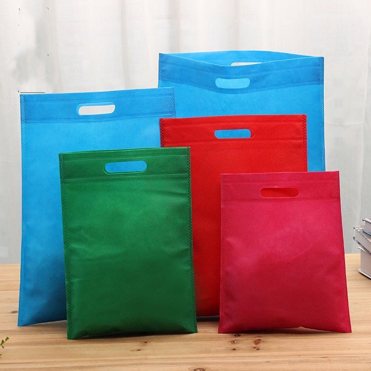 50 Pcs Eco Bag Flat Non-woven Handbag 4 Sizes 10 Colors D Cut Pouch ...
