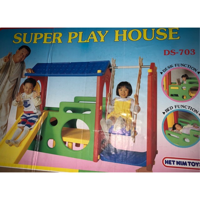 outdoor playhouse with slide and swing