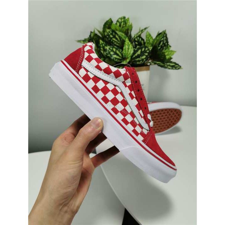 red low top checkered vans