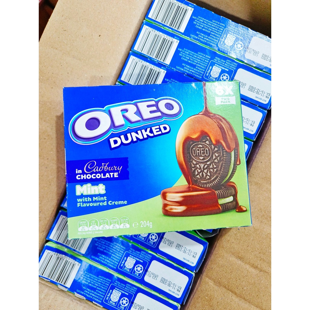 CADBURY ENROBED WHITE/DAIRY MILK OREO COOKIE COVERED WITH CHOCOLATE