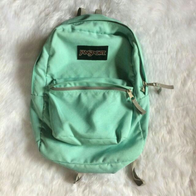 mint green jansport bag