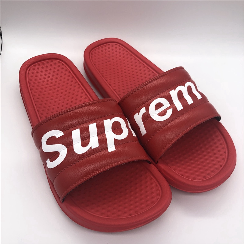 supreme flip flops red