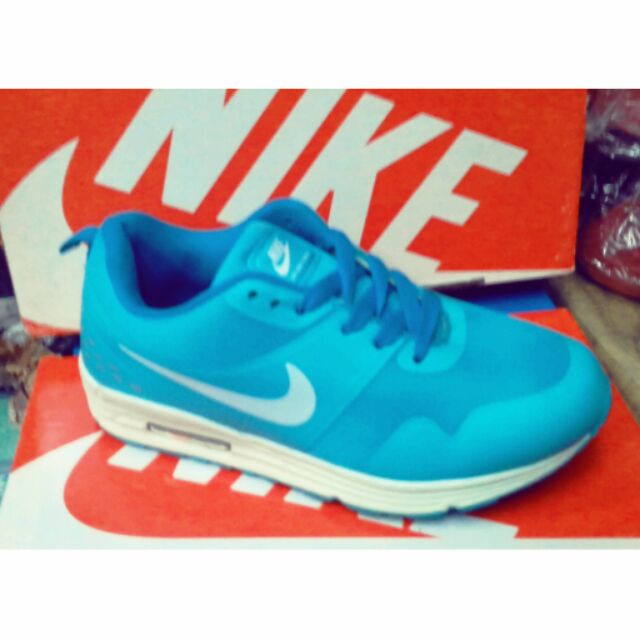 neon blue nike shoes