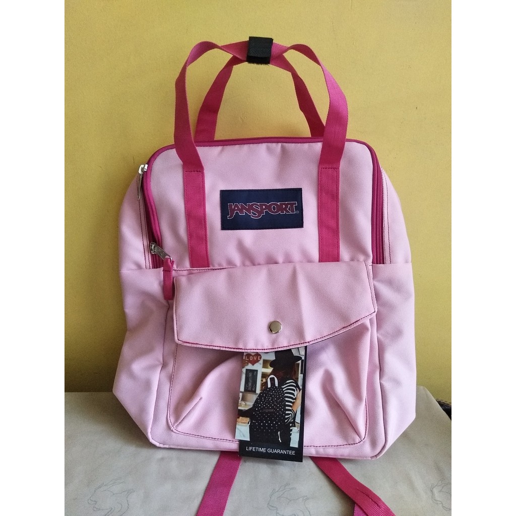 baby pink jansport backpack