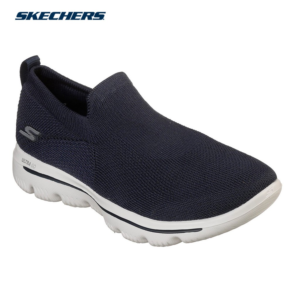 navy and white skechers