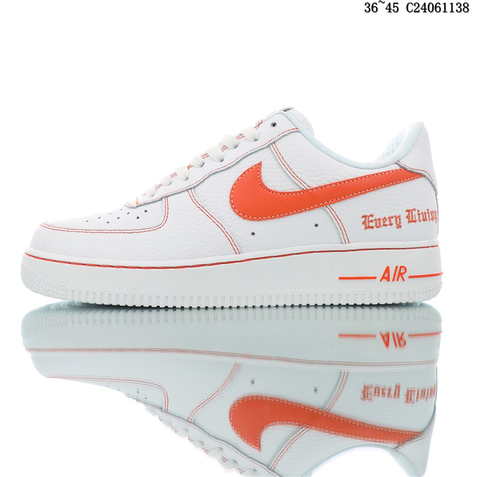 nike white and orange shoes