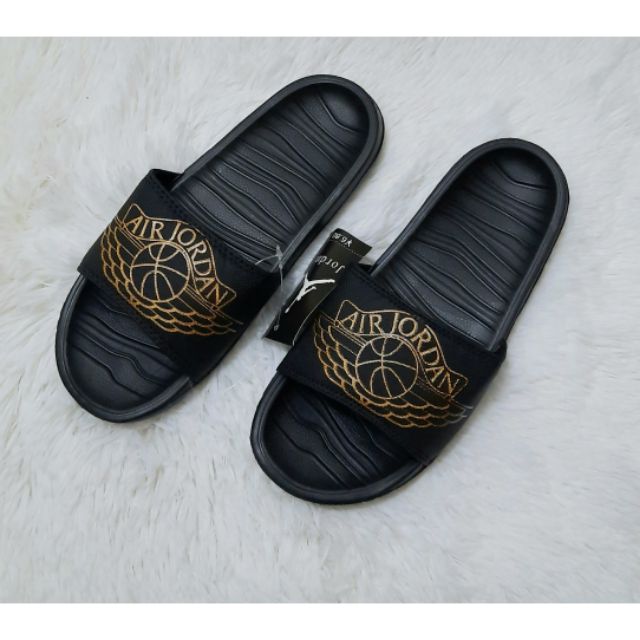 black and gold jordan slides