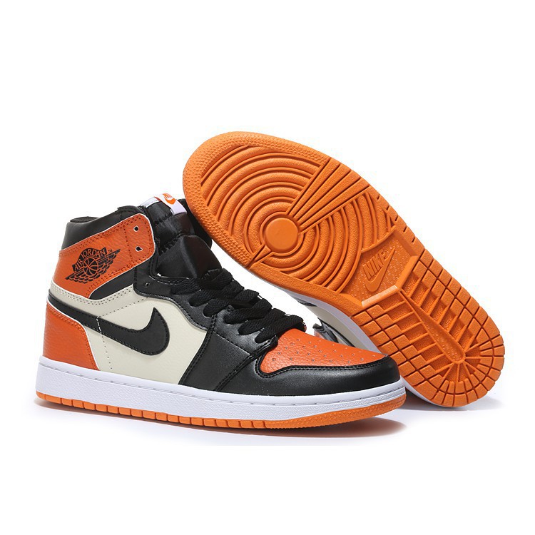 orange white and black air jordan 1