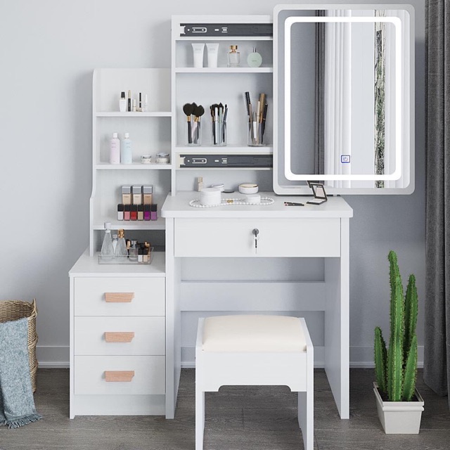 vanity with desk and lights