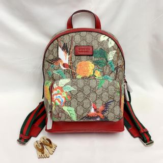 gucci supreme sling backpack