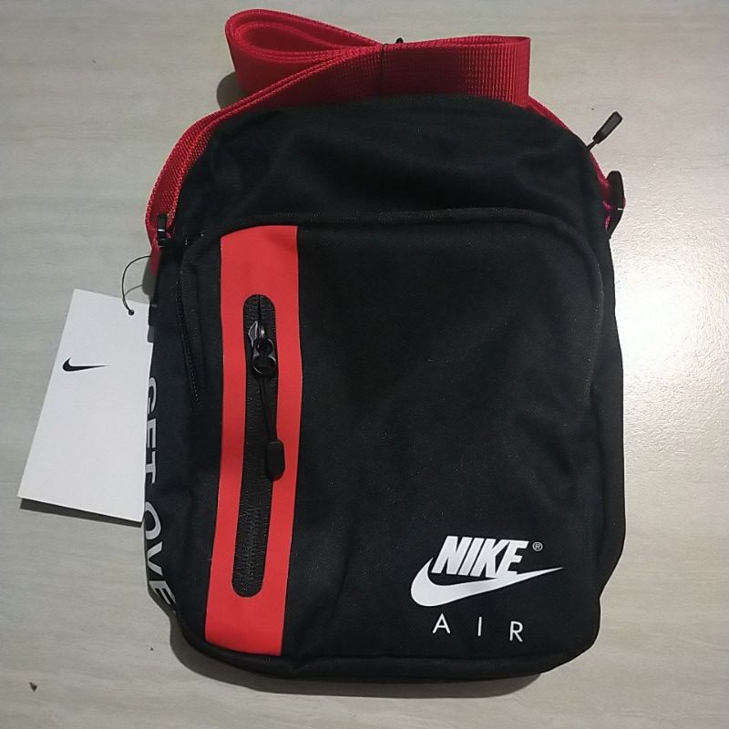 Nike tech sling bag online