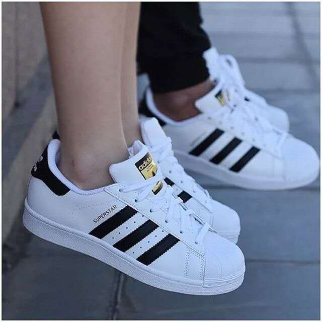 couple shoes adidas white