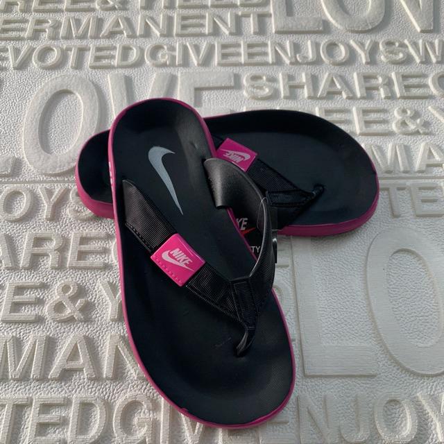 buy nike slippers at 50 off