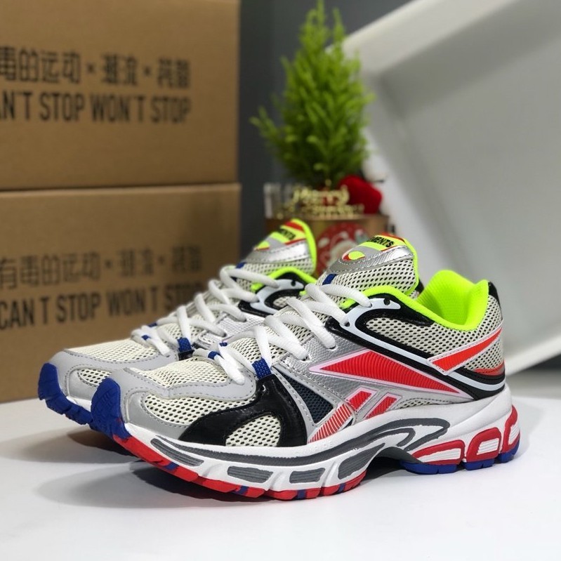 reebok spikes running shoes