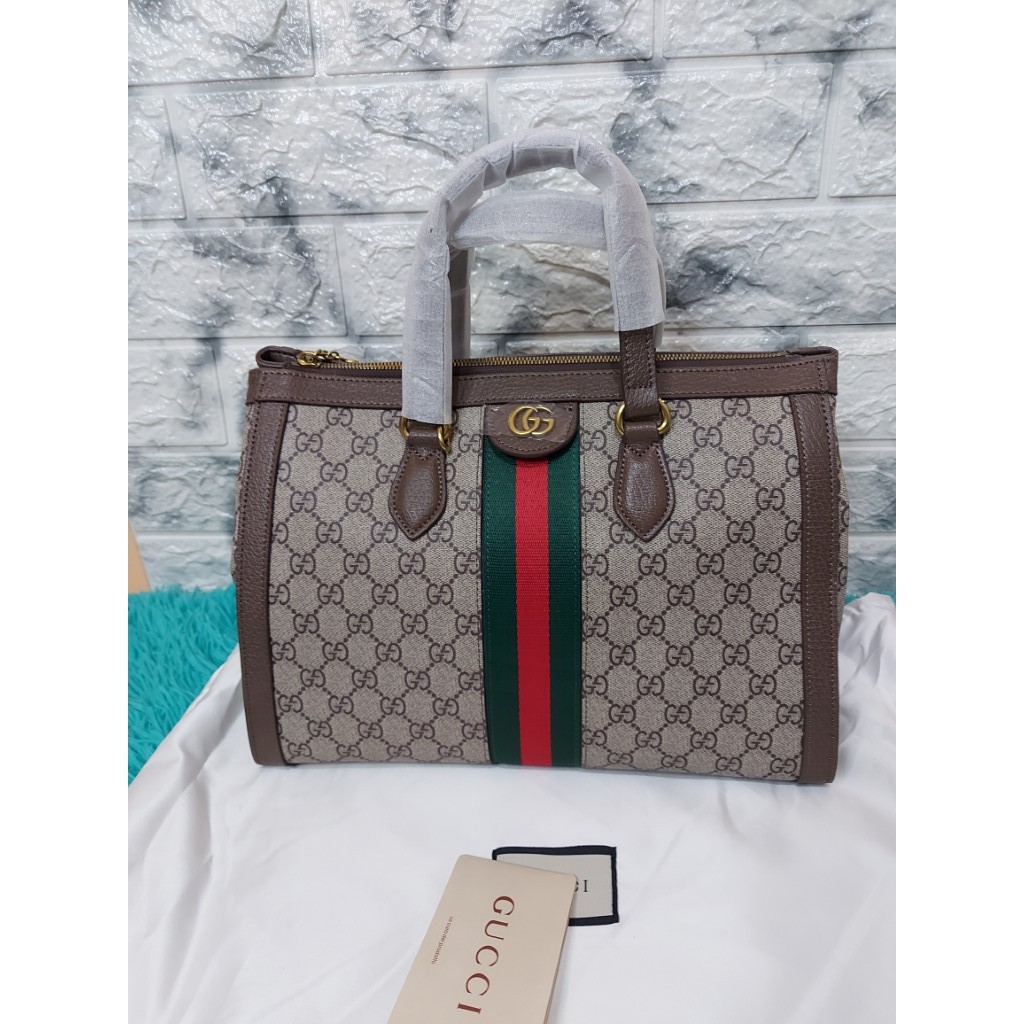 ophidia medium top handle bag